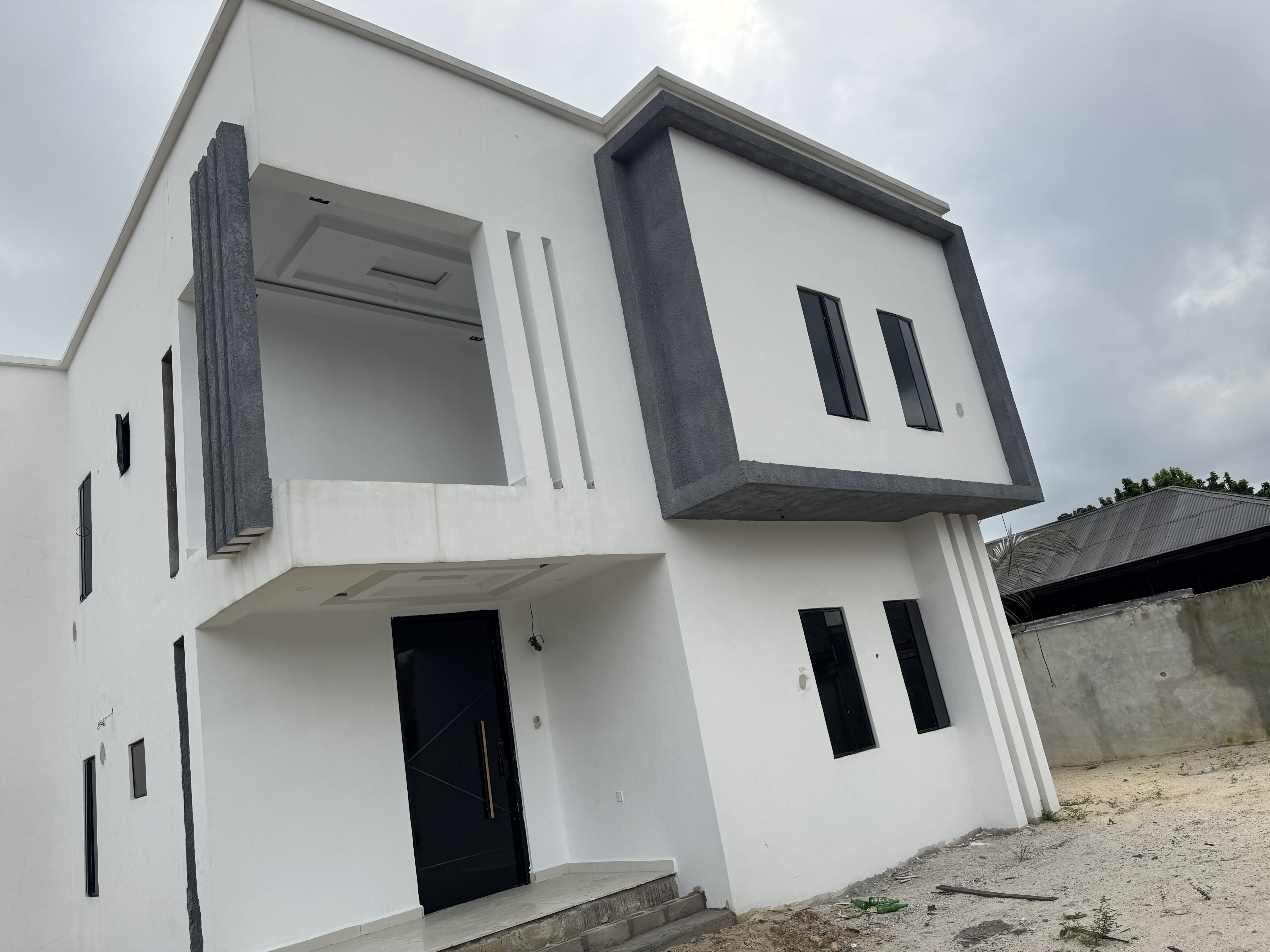 Wide exterior view of the completed Thambama City 4-bedroom duplex